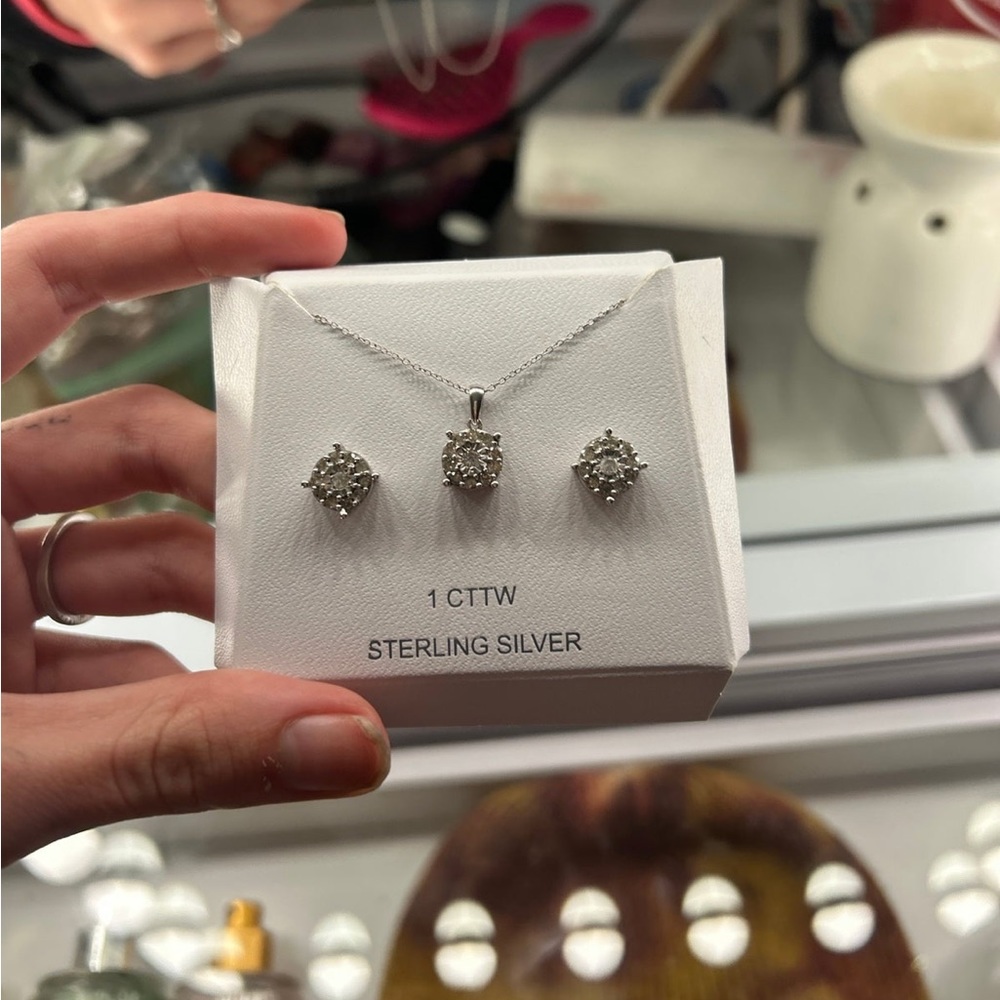 earrings and necklace set. brand new never worn still has price tag